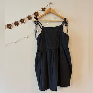 Black tank dress. Worn but great condition, no rips or snags.